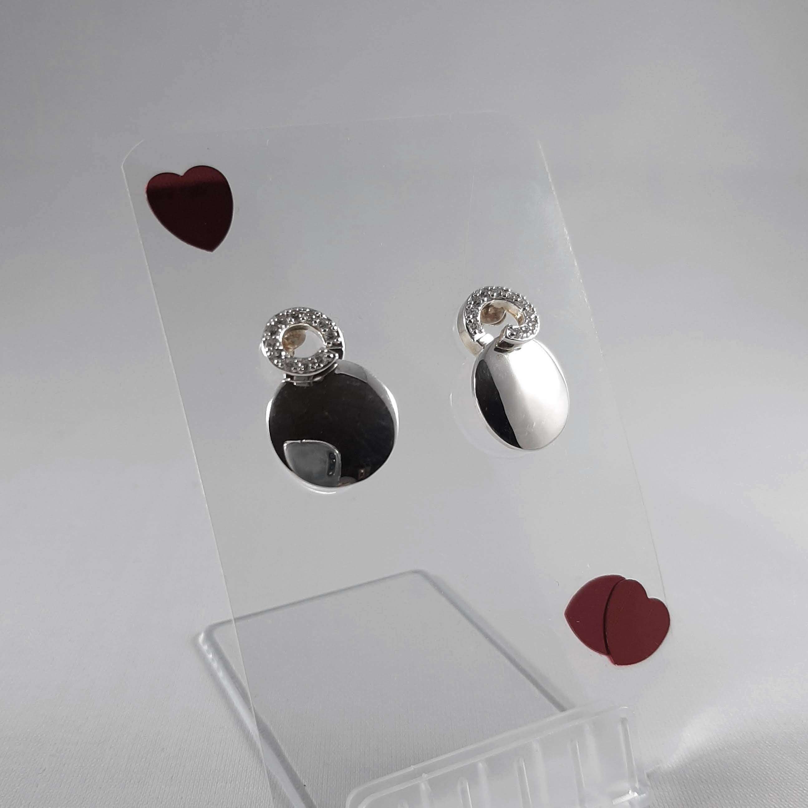 Endearing Collection Sterling Silver Earrings with CZ Detail