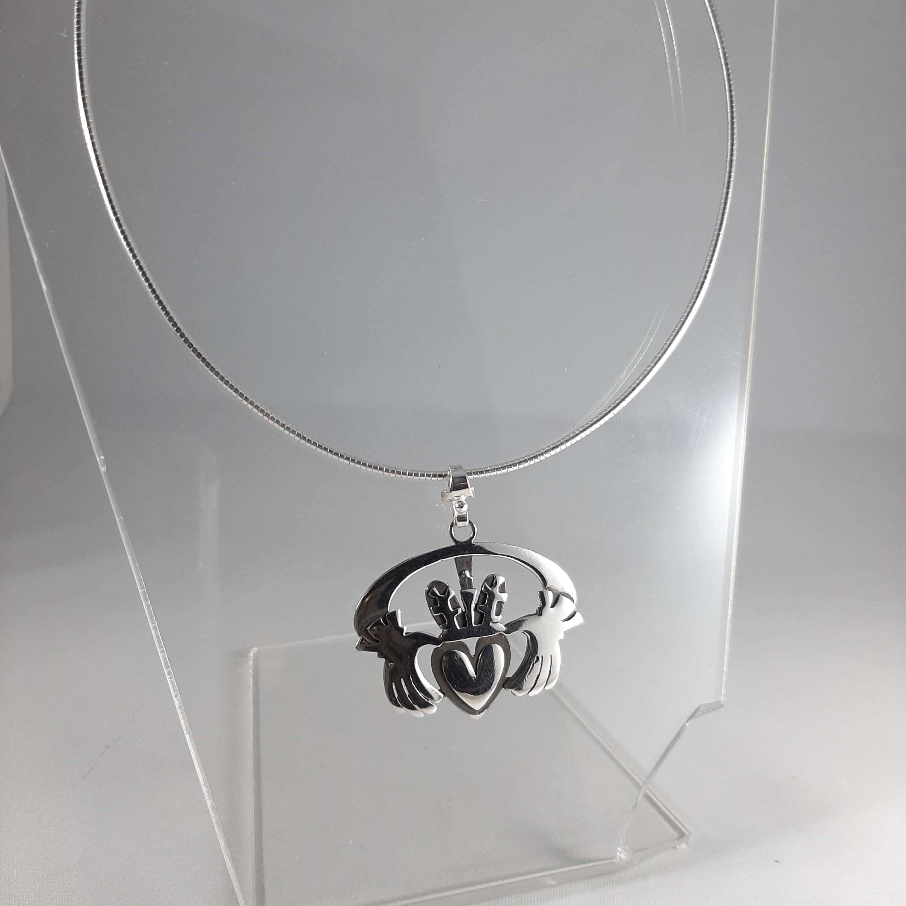 Handcrafted Sterling Silver Claddagh Pendant Mounted on a Silver Torc Neckpiece
